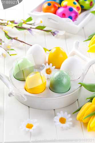 Image of Easter eggs with spring flowers