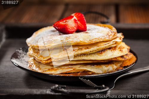 Image of Crepes with fresh strawberries