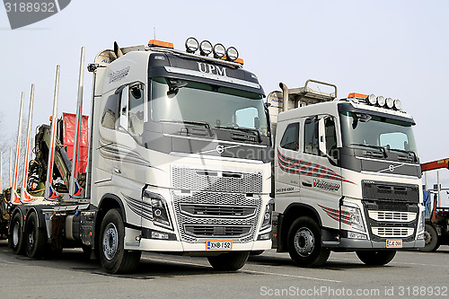 Image of Two Modern Volvo FH Logging Trucks