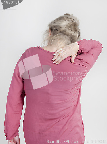 Image of elderly woman with back pain