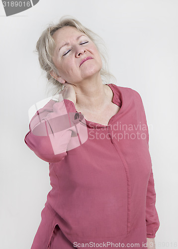 Image of Woman holding his neck