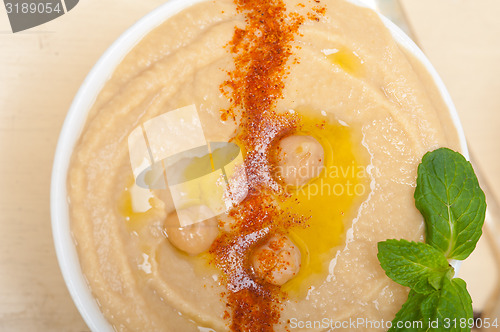 Image of Hummus with mint on top