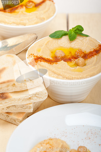 Image of Hummus with pita bread 