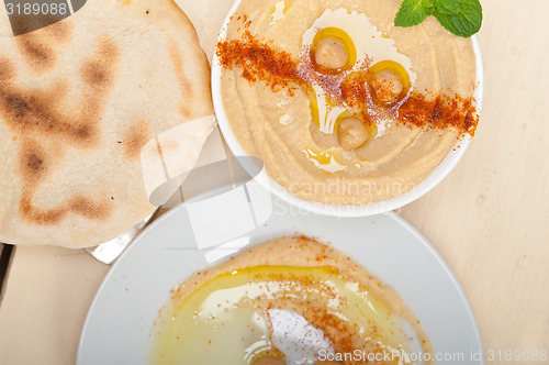 Image of Hummus with pita bread 