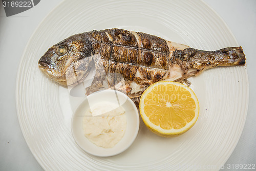 Image of Grilled fish with lemon 