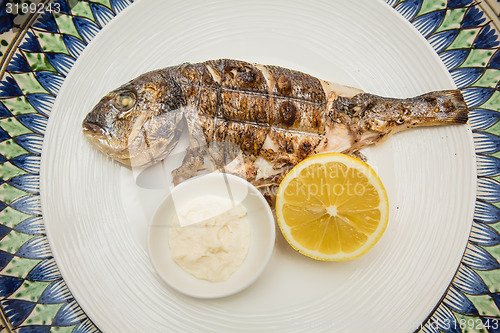 Image of Grilled fish with lemon 