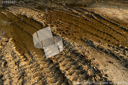 Image of Dirty broken rural road 