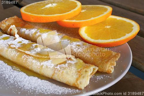 Image of pancakes with oranges