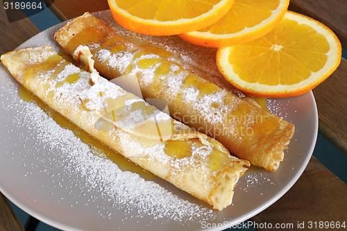 Image of pancakes with oranges