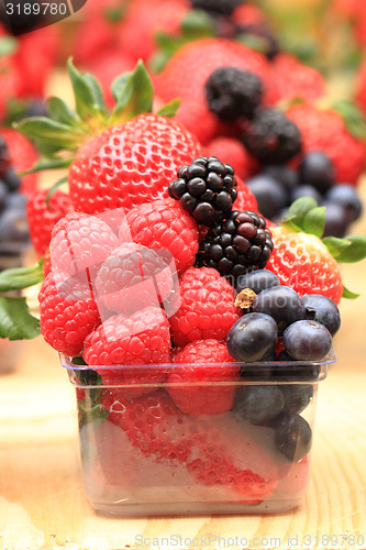 Image of raspberries, blackberries, strawberries summer background