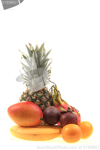 Image of pineapple mango orange banana and dragon fruit