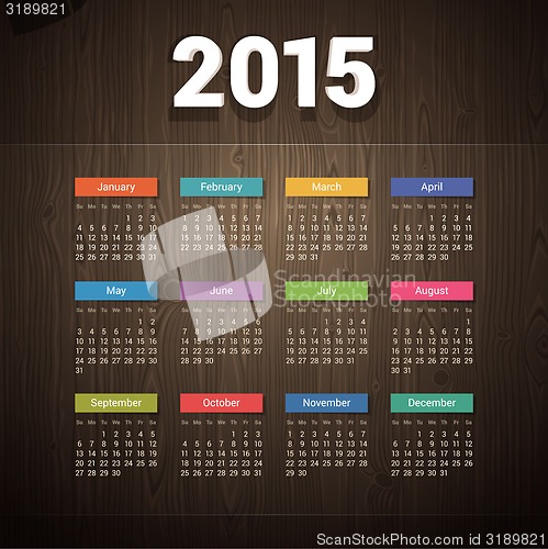 Image of Simple 2015 calendar on Dark Wooden Background