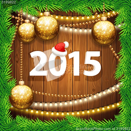 Image of Happy New Year 2015 on Wooden Background with Christmas Baubles