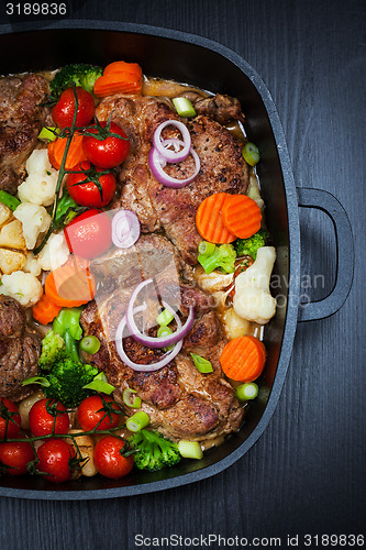 Image of Baked pork meat with vegetable