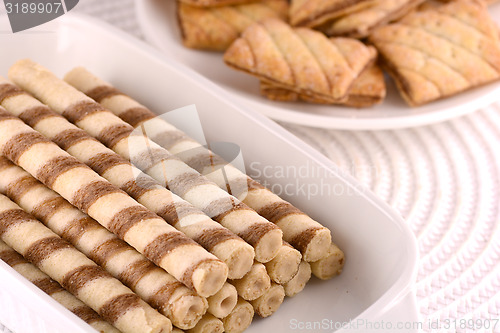 Image of sweet cake on white plate with lemon