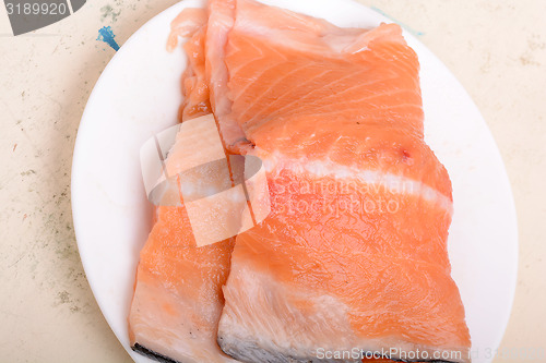 Image of Fresh uncooked red fish fillet slices