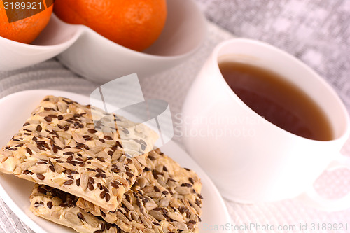 Image of sweet cake on white plate and fruits