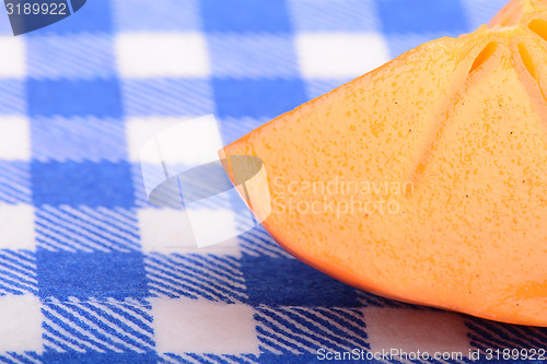 Image of persimmon slice close up