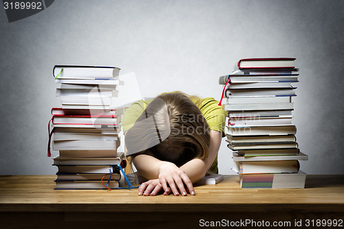 Image of Overworked female student