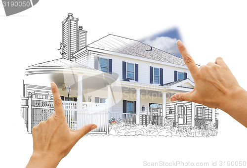 Image of Hands Framing House Drawing and Photo on White