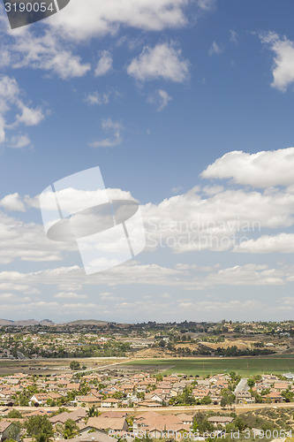 Image of Contemporary Neighborhood and Majestic Clouds