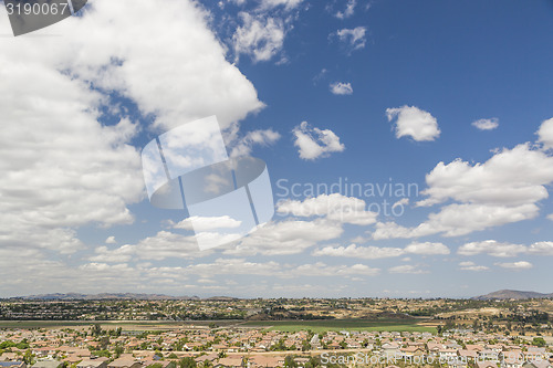 Image of Contemporary Neighborhood and Majestic Clouds