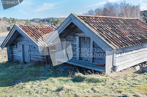 Image of two old boathouse