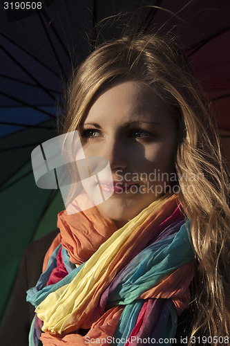 Image of Young long-haired curly blonde woman