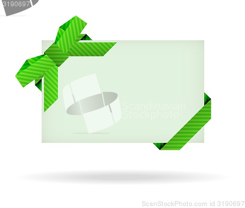 Image of green gift card with dashed ribbon, dashed bow and shadow on whi