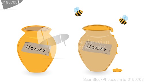 Image of cup of honey and flying bee