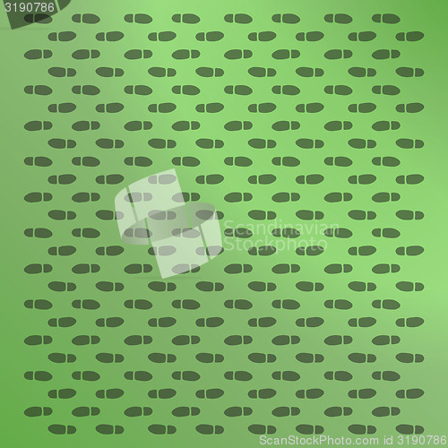 Image of green background with footprints