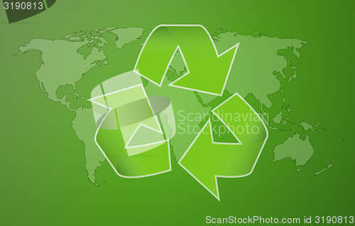 Image of green worldmap with symbol of recycling