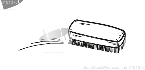 Image of brush and cleaning up