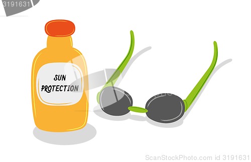 Image of sun oil and sun glasses