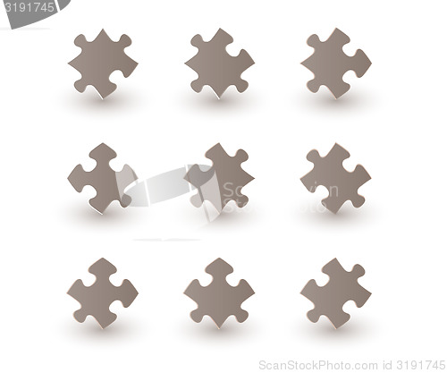 Image of brown puzzle pieces