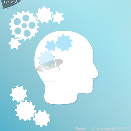 Image of blue background with cogwheel and head