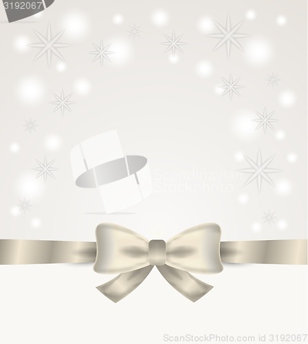 Image of silver ribbon and bow with stars and snow flakes