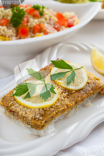 Image of Baked fish fillet wih couscous salad