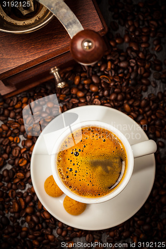 Image of Espresso cup in coffee beans