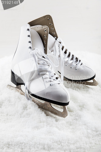 Image of Ice skates with cap