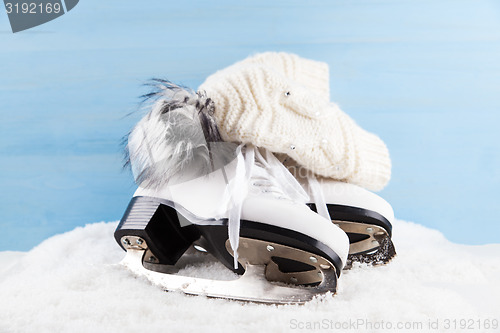 Image of Ice skates with cap