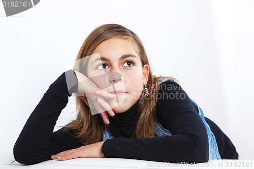 Image of Portrait of schoolgirl thinking