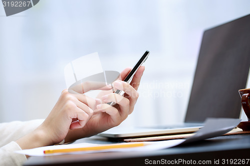 Image of Woman using a mobile phone 