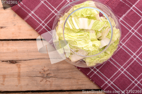 Image of Cabbage chopped in glass bowl