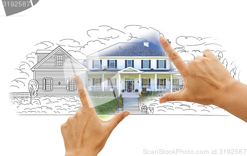 Image of Hands Framing House Drawing and Photo on White