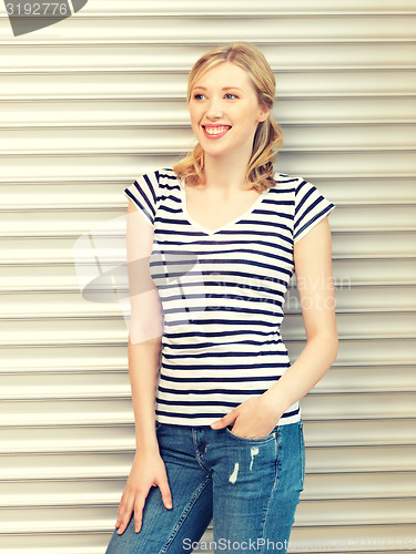Image of happy and smiling teenage girl