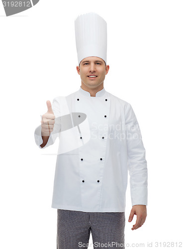 Image of happy male chef cook showing thumbs up