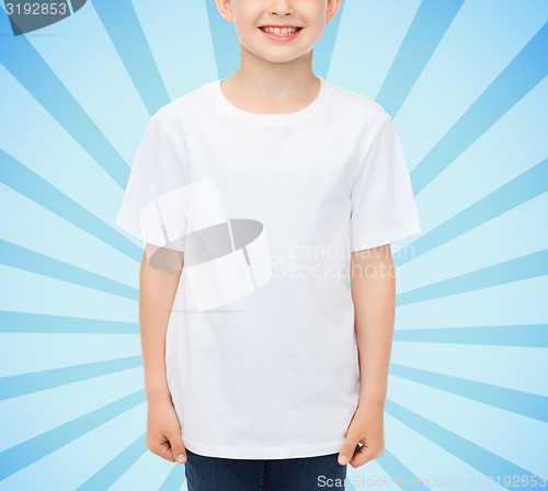 Image of smiling little boy in white blank t-shirt