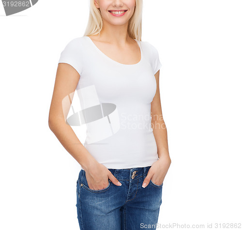 Image of smiling woman in blank white t-shirt