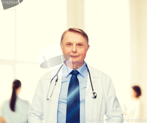 Image of smiling doctor or professor with stethoscope